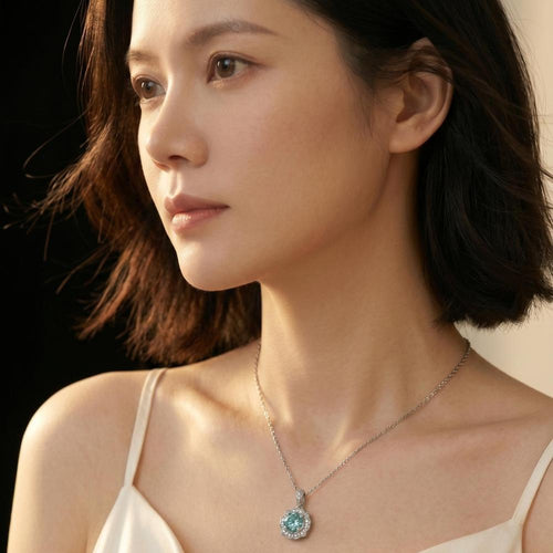 1ct mint green moissanite cluster pendant necklace on model — cyan halo, 925 silver chain | TARA AYARH LUNE