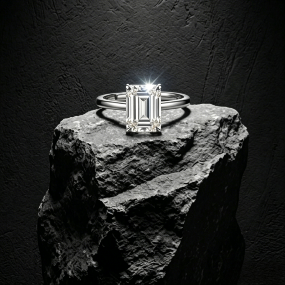 5x7mm emerald-cut moissanite solitaire ring — 1ct D-color VVS1, four-prong open mount | TARA AYARH LUNE