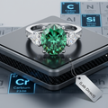 5ct oval-cut green moissanite ring with pear accents — infinite trinity setting, VVS1, 925 sterling silver | TARA AYARH LUNE
