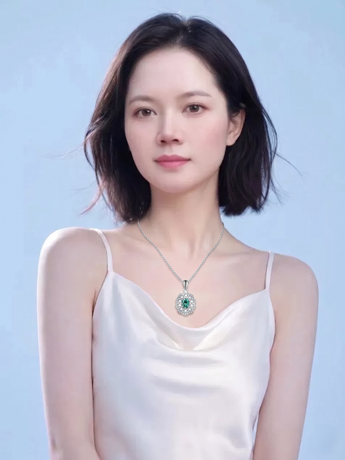 Oval green moissanite double oval lace halo pendant on model — 4×6mm, collarbone length | TARA AYARH LUNE