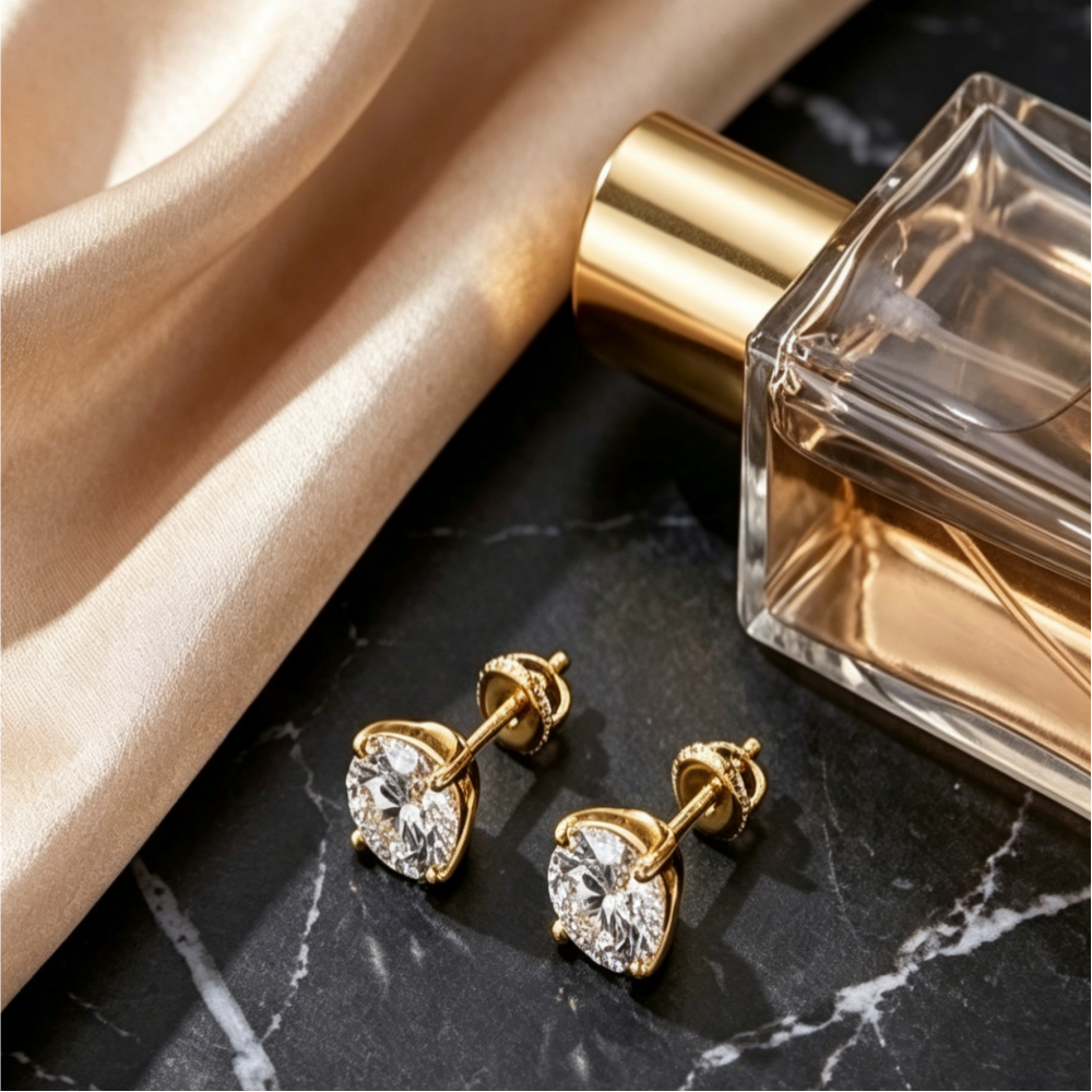 Round-cut moissanite 4-prong stud earrings — 14K gold finish, lifestyle editorial | TARA AYARH LUNE